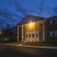 Exterior of Orangewood Park apartments in Levittown at night